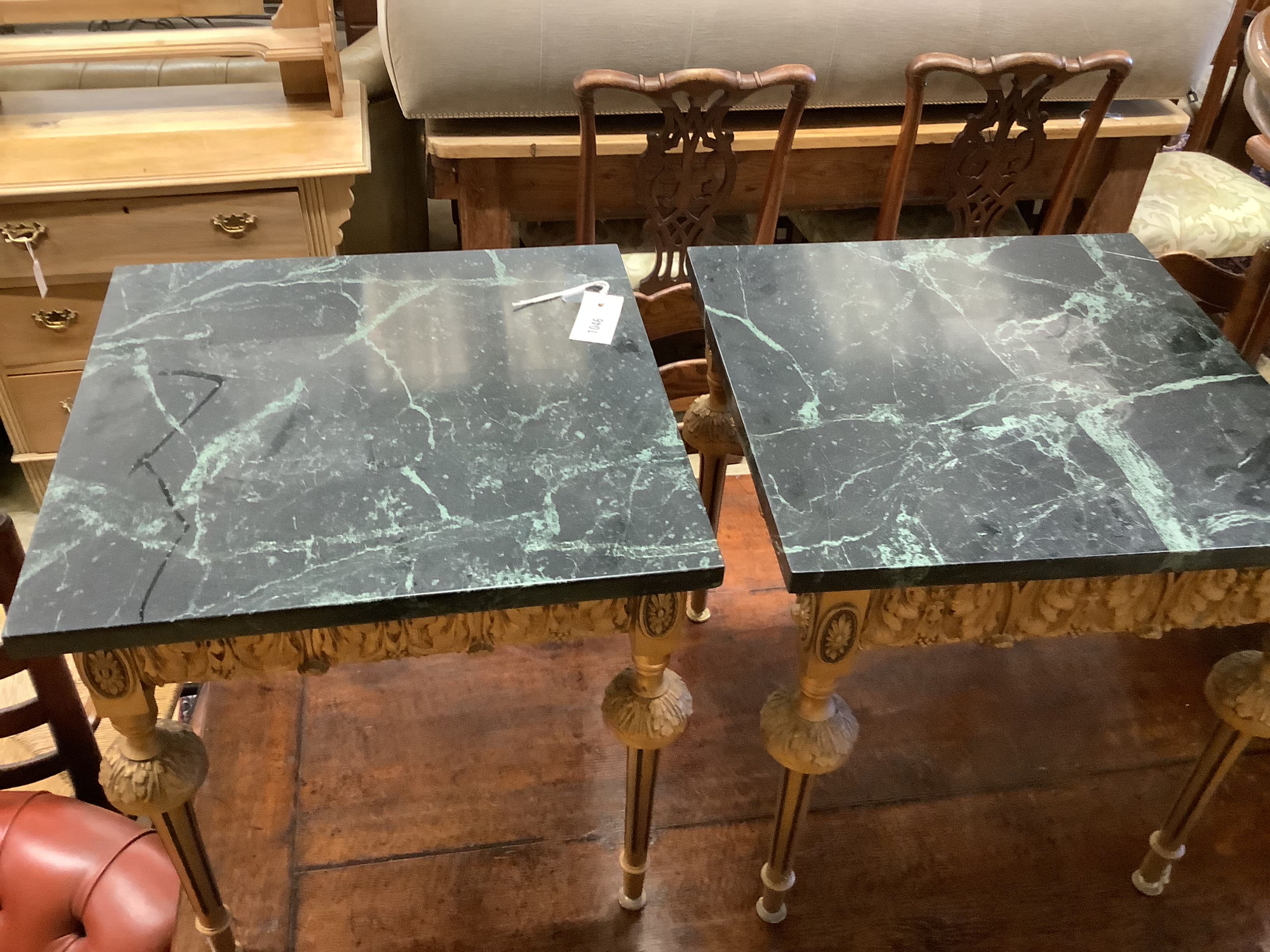 A pair of square giltwood side tables with variegated black marble tops, width 45cm, height 49cm